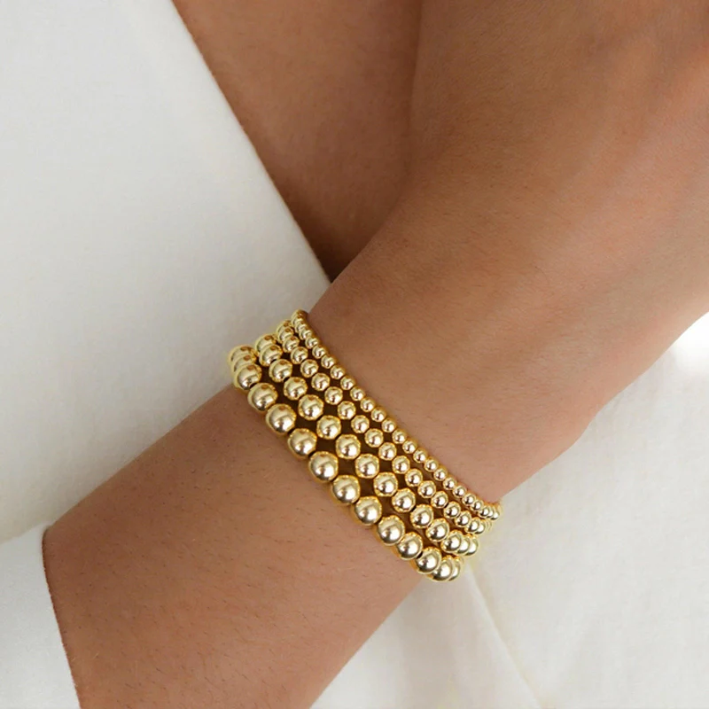 Set of 4 Gold Beaded Bracelets - Image 2